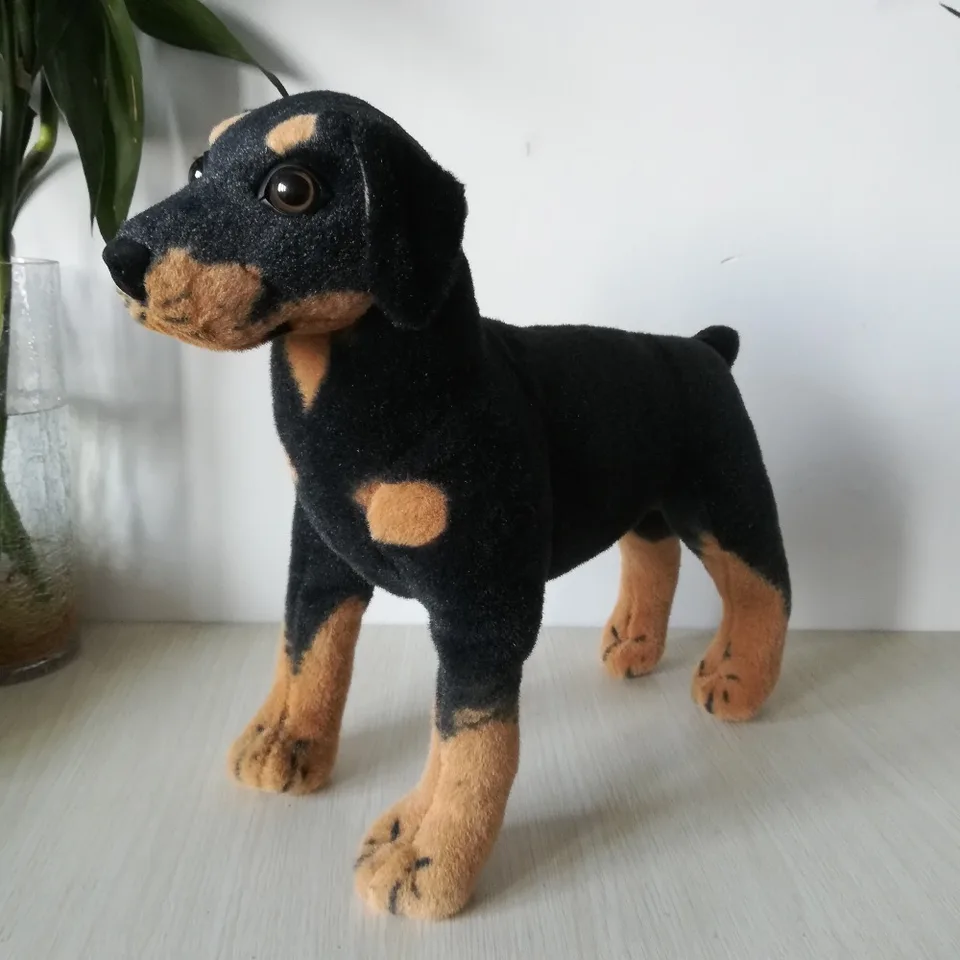 perro negro peluche