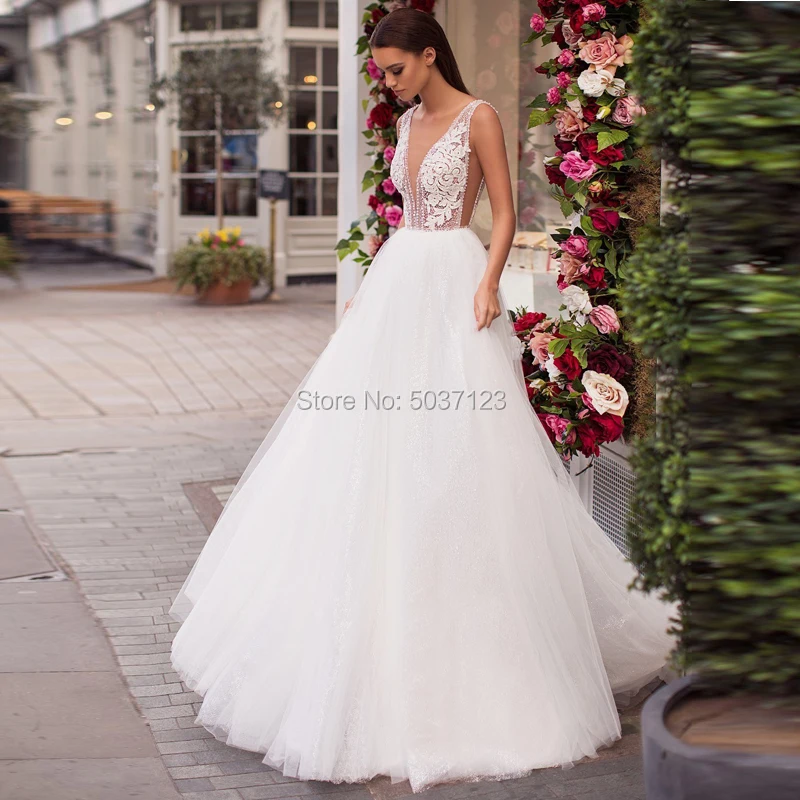 Strand EEN Line Trouwjurken V-hals Kralen Backless Vestido De Noiva Kant Applicaties Bridal Gown Hof Trein Strand EEN Line Trouwjurken V-hals Kralen Backless Vestido De Noiva Kant Applicaties Bridal Gown Hof Trein