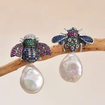 

GG Jewelry White Coin Pearl White Gold Plated Battle CZ Earrings