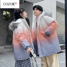 The 2021 autumn/winter new couple down jacket pie overcomes the large profile tooling thickened mid-length jacket gradient color