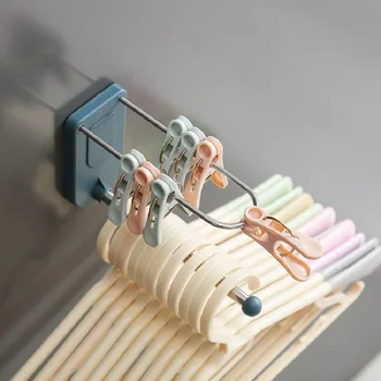 

YIGUISI TikTok Stainless steel seamless wall hanger storage rack balcony free punching multi-function hanger clip storage racks