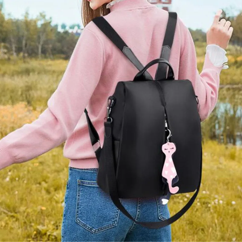 Mochila de nylon de uso múltiple para dama, morral de nylon de uso  múltiple, grande de color sólido con colgante de gato, bolso de hombro para  viajes simples| | - AliExpress