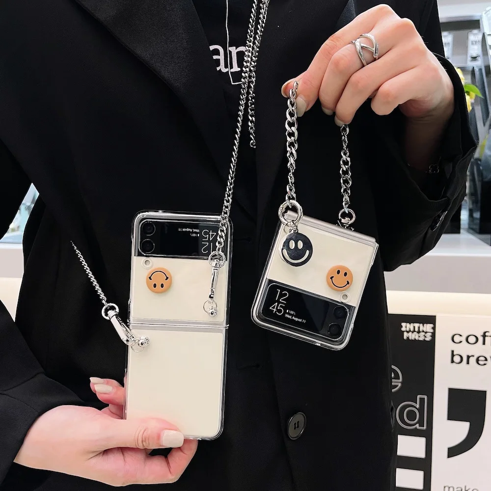 https://ae01.alicdn.com/kf/Hb6732ba6155c4659a1a1a00f7a441bcf6/Cute-Smiley-Metal-Chain-Phone-Case-for-Samsung-Galaxy-Z-Flip-3-ZFlip3-Lovely-Stand-Folding.jpg