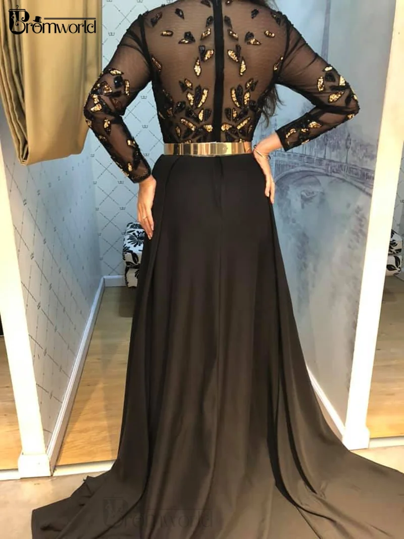 Evening black dress with a gold belt. Ab... | Stock Video | Pond5