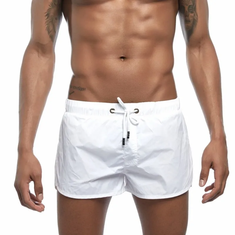Hot Selling Men's Beach Shorts Polyester Quick-drying Sports Casual Shorts Simple Type Surfing& Beach Shorts - Цвет: Белый