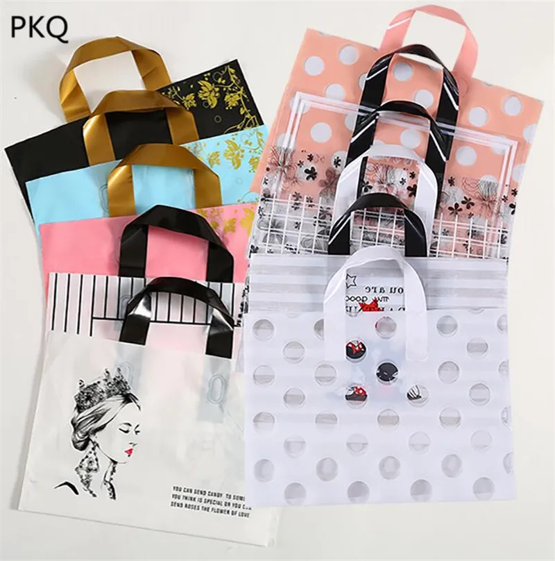 

50pcs New Arrival Gift Packaging Bag Nice Present Bag for Clothes/Shoes Plastic Shopping Bags With handle 35x25x8cm