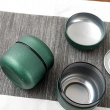 Xin Jia Yi упаковка матовый черный печатные круглые жестяные банки для чая Глубокая крышка круглые жестяные банки для чая металлическая жестяная коробка