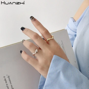 

HUANZHI 2019 New Twisted Irregular Wavy Glossy Minimalist Metal Ring Geometric Line Open Ring for Women Men Party Jewelry Gifts