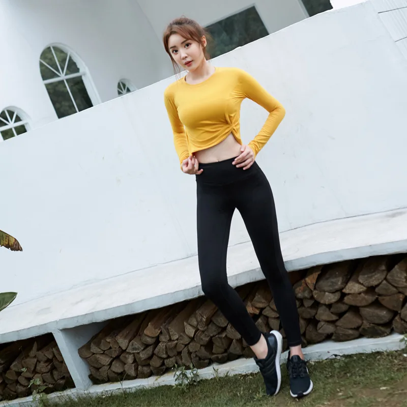

2019 the new long-sleeved gym sports suction sweat dry suit exposed umbilical body trousers running dance Yoga suit