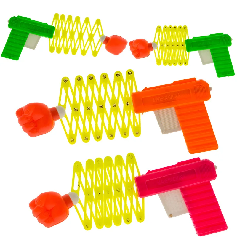 Retractable Fist Shooter Trick Toy Gun Funny Child Kids plastic