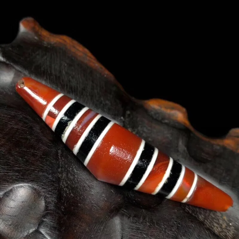

Old red weathered Oxide layer chalcedony beads horn-shaped Nepalese multi-line DZI