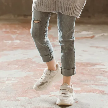 

New gray personality casual wild hole hollow edge middle waist nine points jeans version of the girls pants fashion girl jeans