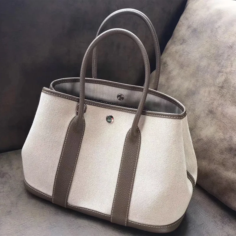 

Autumn And Winter New Style Garden Bag High-End Canvas Bag with Full-grain Leather Embossed Leather Hand Shoulder Shopping Bag W