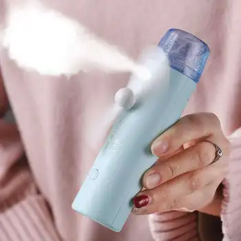 

Sterilization Hot Sale Spray Beauty Moisturizing Light Handheld Fan Moisturizer USB Charging Portable Small Fan