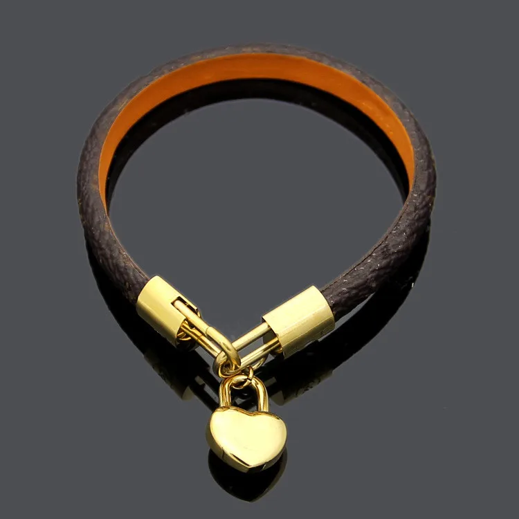 

Titanium steel ornaments wholesale explosive old pattern heart-shaped Leather Bracelet lady peach heart V leather bracelet