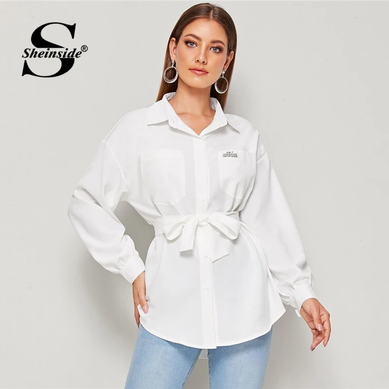 

Sheinside Casual White Letter Print Pocket Blouse Women 2019 Autumn Lantern Sleeve Longline Blouses Ladies Solid Belted Top