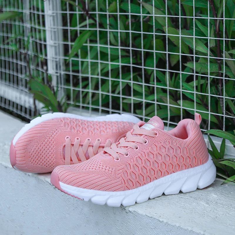 

2019 spring and autumn fashion new ultra light women's shoes honeycomb face low to help fly woven running shoes sneakers