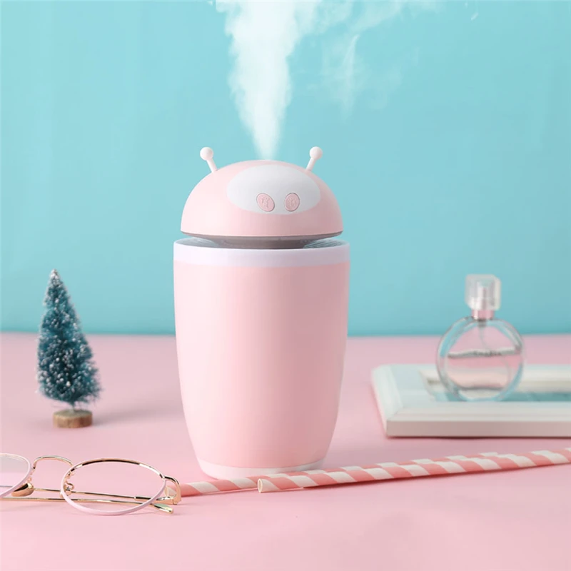 

2020 New Mini Air Humidifier Essential Oil Diffuser Creative Astronaut 500ml Luminous Three-in-one USB Humidifier Home Atomizer