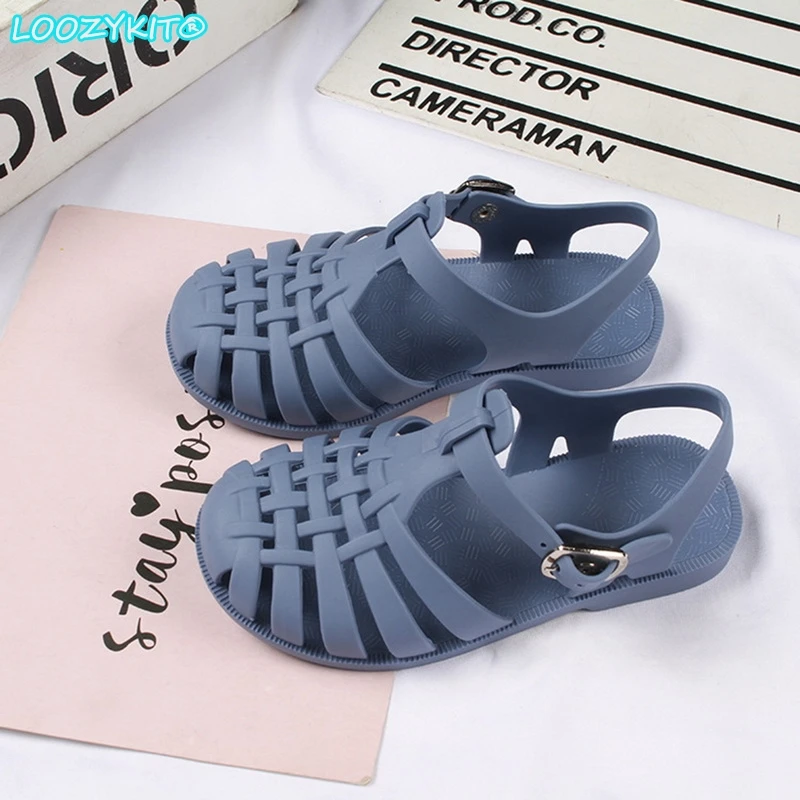 2021 niños sandalias bebé niña suave antideslizante zapatos de princesa zapatos dulces zapatos Jelly de playa niños Casual romano zapatillas tamaño de cheque
