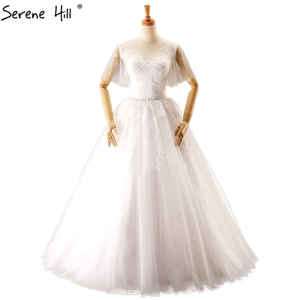 Свадебное платье с вырезом лодочкой белое аппликацией из тюля простое свадебное