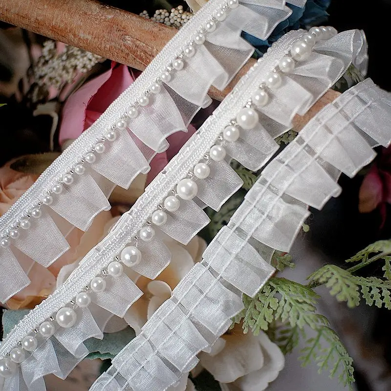 кружева складками. кружевная ткань складки. кружева складками. ткань с оборками. ткань с рюшами.