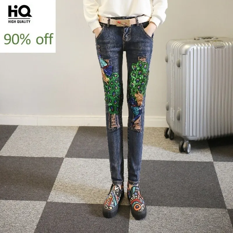 

Female Fashion Slim Fit Denim Pants Sequins Peacock Embellished Ripped Distrressed Womens Ankle Length Pants Pockets Size 25- 31