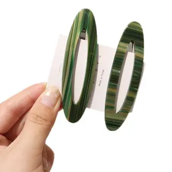 

Minimalist Womens Metal Alloy BB Hair Clips Hollow Oval Shape Luster Hairpins Textured Leopard Colored Decorative Snap Barrettes