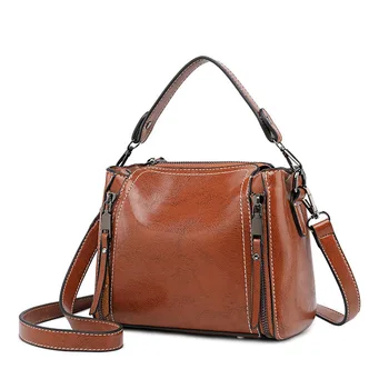 

Summer new female bag fashionable retro small bag female oil wax leather bucket bag joker trend hand bill of lading shoulder bag