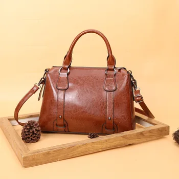 

Women's bag 2020 new PU leather solid color women's bag zipper shoulder slung portable soft surface retro simple shoulder bag