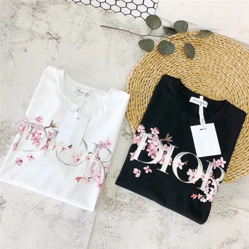 Camiseta con estampado de marca Unisex, camisa de manga corta con cuello redondo a la moda, S-3XL