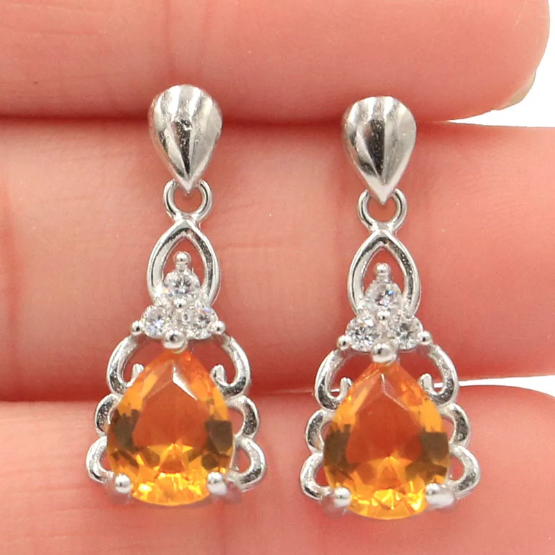 Серьги SheCrown в форме капли сделанные из золотого цитрина с белым кубическим