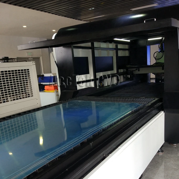 Fiber laser cutting machine with full enclosed structure, rotary axis and auto exchange working table