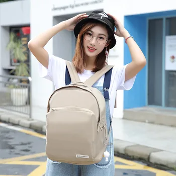 

Solid color waterproof Oxford casual backpack junior high school high school schoolbag academic couples contracted high-volume