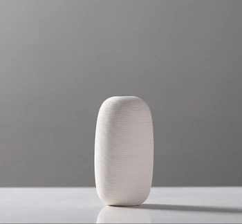 

Simple Modern White Porcelain Burning Ceramic Vase Three-piece Ceramic Flower Plug Creative White Porcelain Vase