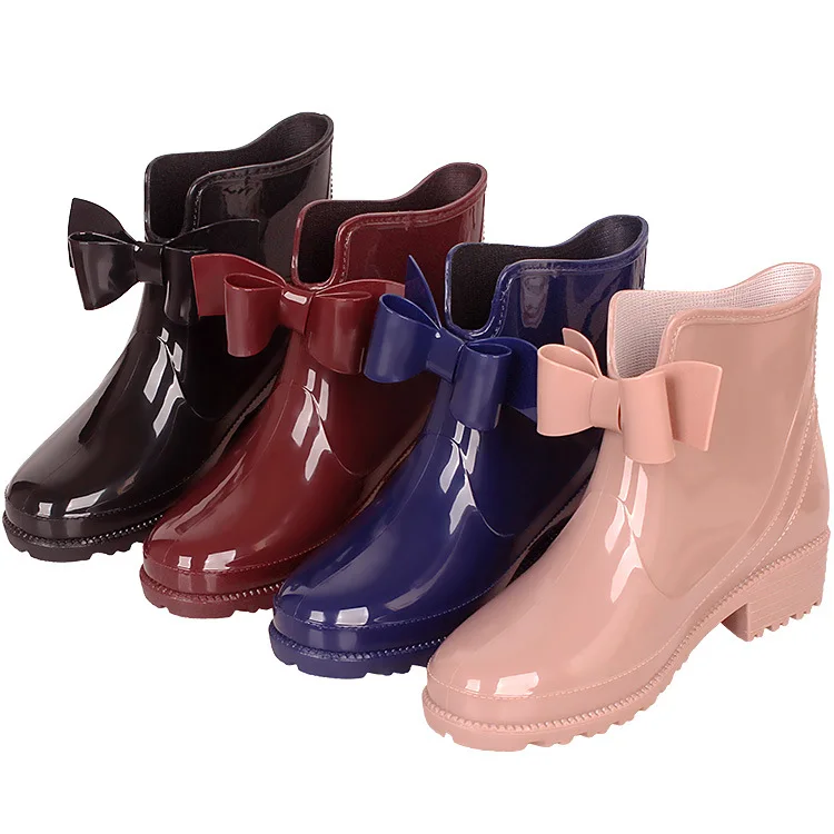 Nuevas botas de goma Mujeres PVC tobillo de lluvia impermeable Moda jalea mujeres banda elástica lluvioso tamaño 36-431