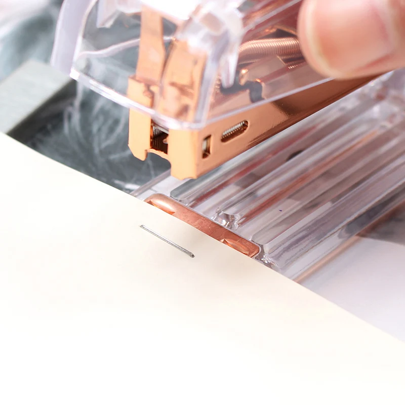 

Rose Gold High-grade Transparent Plastic Stapler Office Study Binding Machine OD889