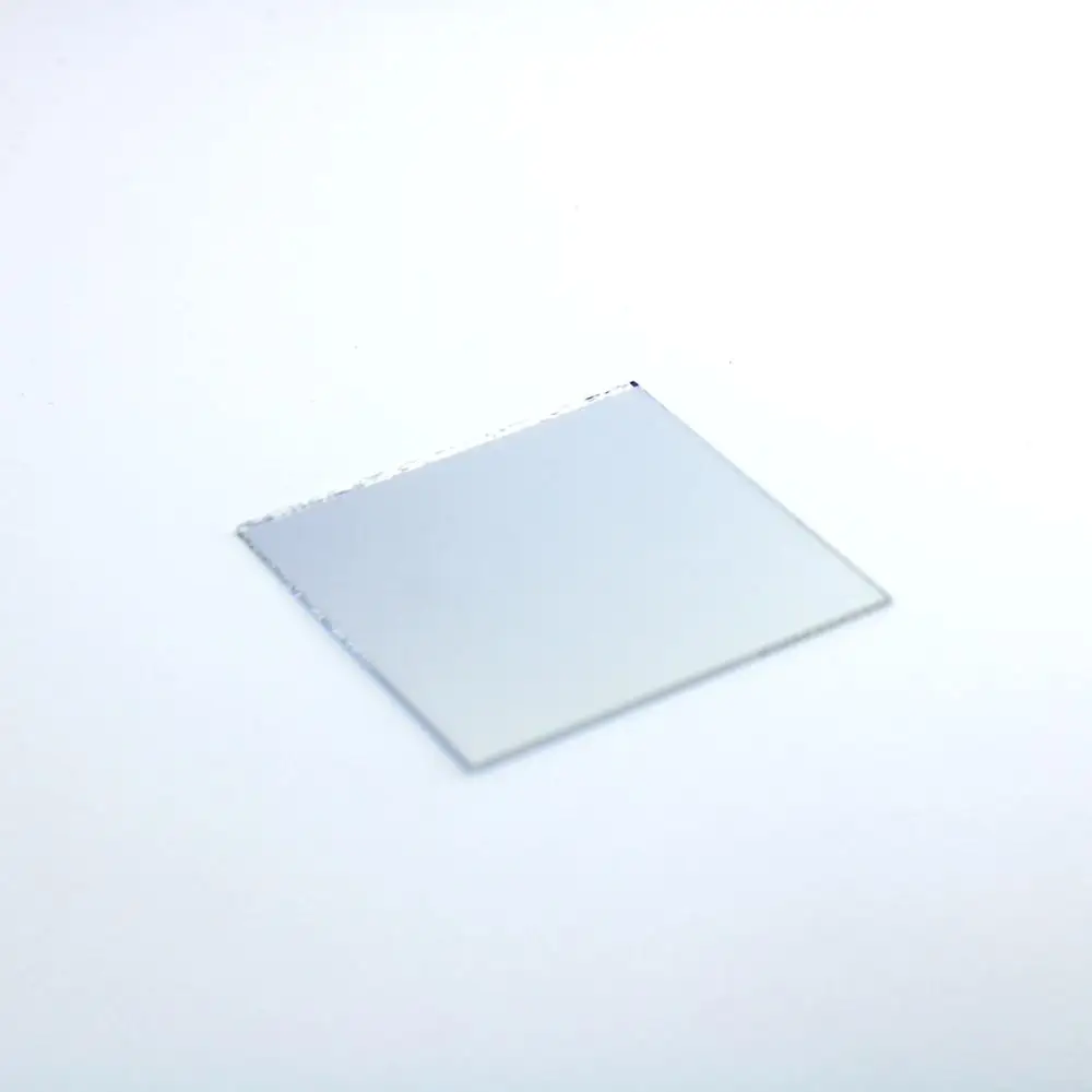 Flat front surface mirror of borosilicate glass