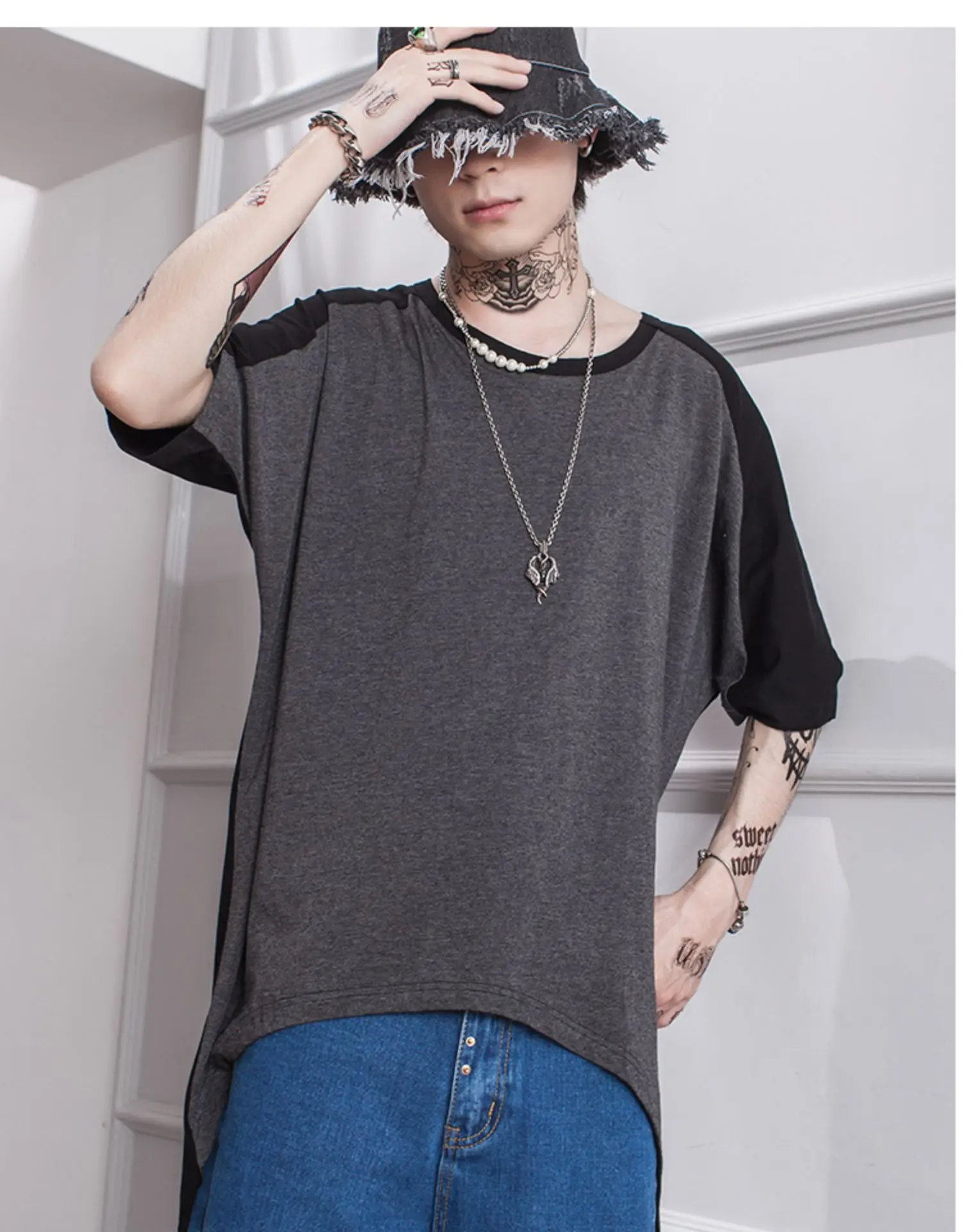 

Men's T-shirt summer wear patchwork bat T-shirt with loose round neck with five-minute sleeves and irregular bottom hem