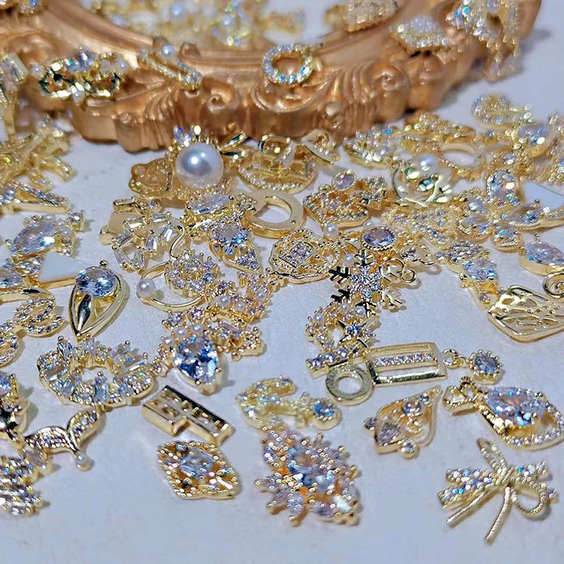 50 unids/lote de dijes de Metal de circón para uñas, formas elegantes, decoración de diamantes de imitación con aleación de oro, mezcla de estilos, cristales, gemas, suministro de uñas