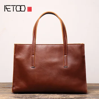 

AETOO Leather hand-held women's bag, head-layer edoric one-shoulder bag, simple hundred with women's stiletto bag.