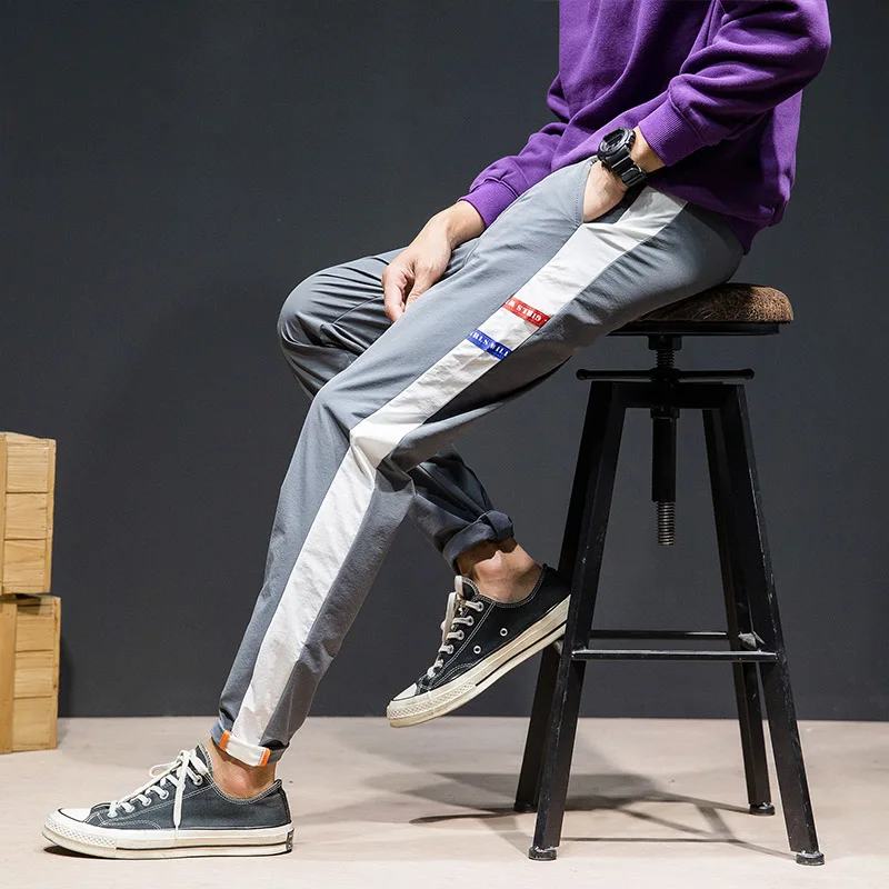Men's fashion sweatpants vertical stripes decoration loose spring and autumn sports pants casual male jogger streetwear