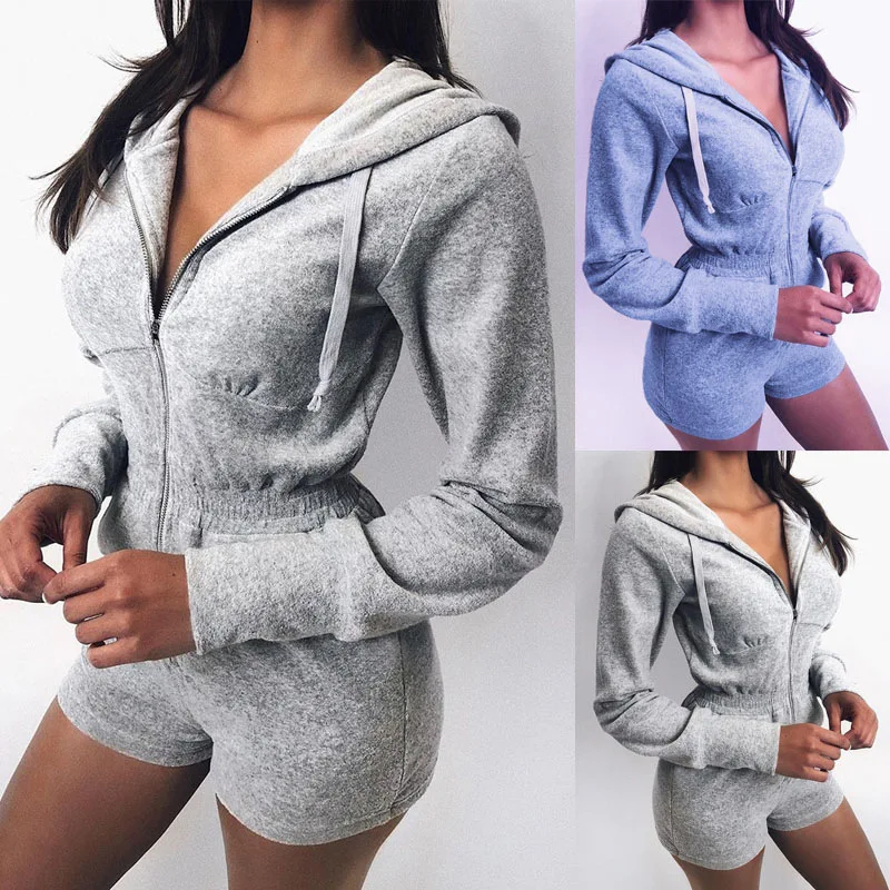 Mono corto deportivo con capucha de manga larga y cremallera para mujer