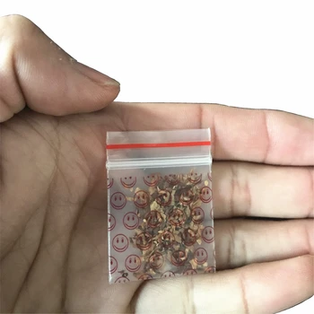 

1 pack (100pcs)cartoon tobacco bag sealed bag storage bag Transparent Red smile pattern with holder tobacco bag pipe