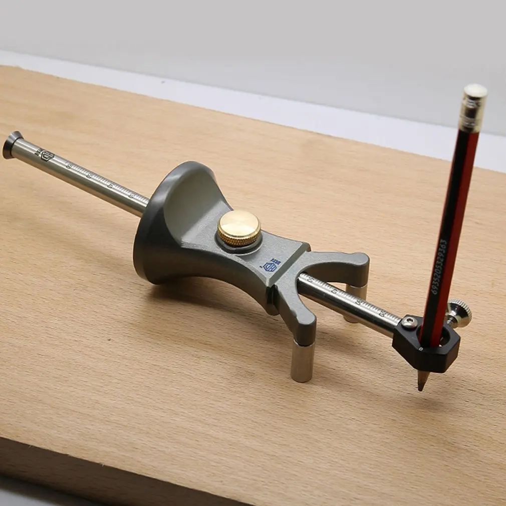 

Multi-Purpose Scriber Parallel Line Drawing Woodworking Linear Arc Marking Tool Pull the arc with a stainless steel roller