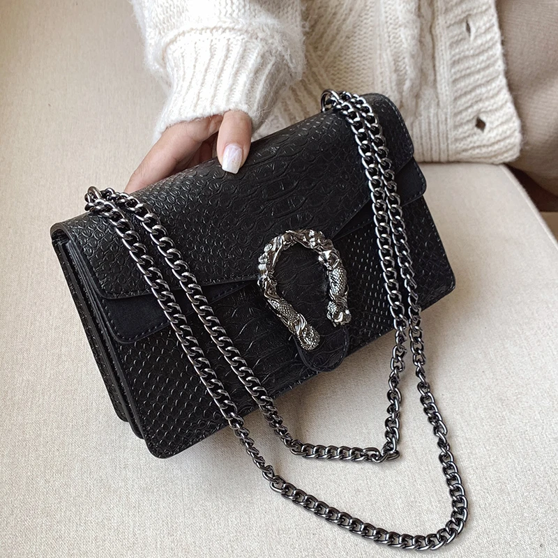 black cross bag with chain