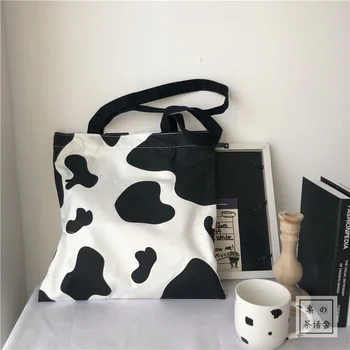 

Cute Cow Hand-held Canvas Bag Simple Literature and Art Ins One-shouldered Female Chic Student Shopping Bag