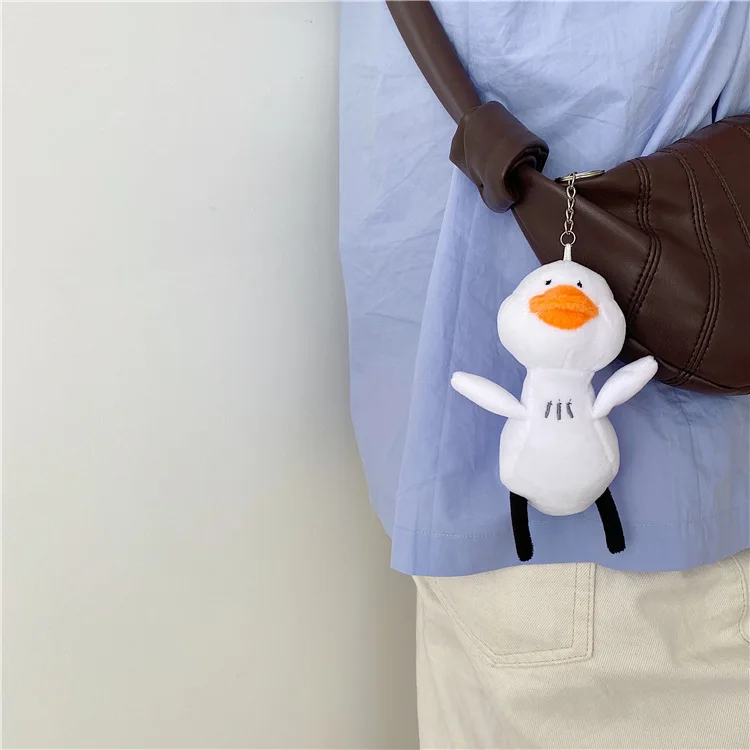 

Cute Stuffed Duck Key Chain Lovely Fuel Duckling Keychain Bag Trinket Earphone Set Car Pendant Accessories Pompom Keyring Gift
