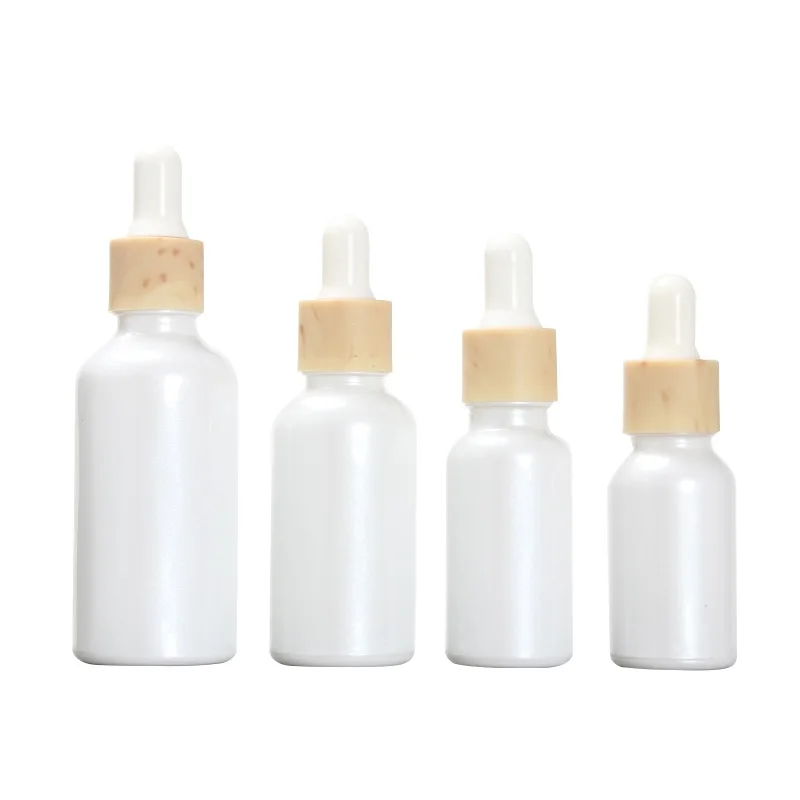 

15pcs Glass Essential Oil Vials 15ml20ml30ml50ml False Wood Ring Refillable Bottle Empty Porcelain White Cosmetic Dropper Bottle