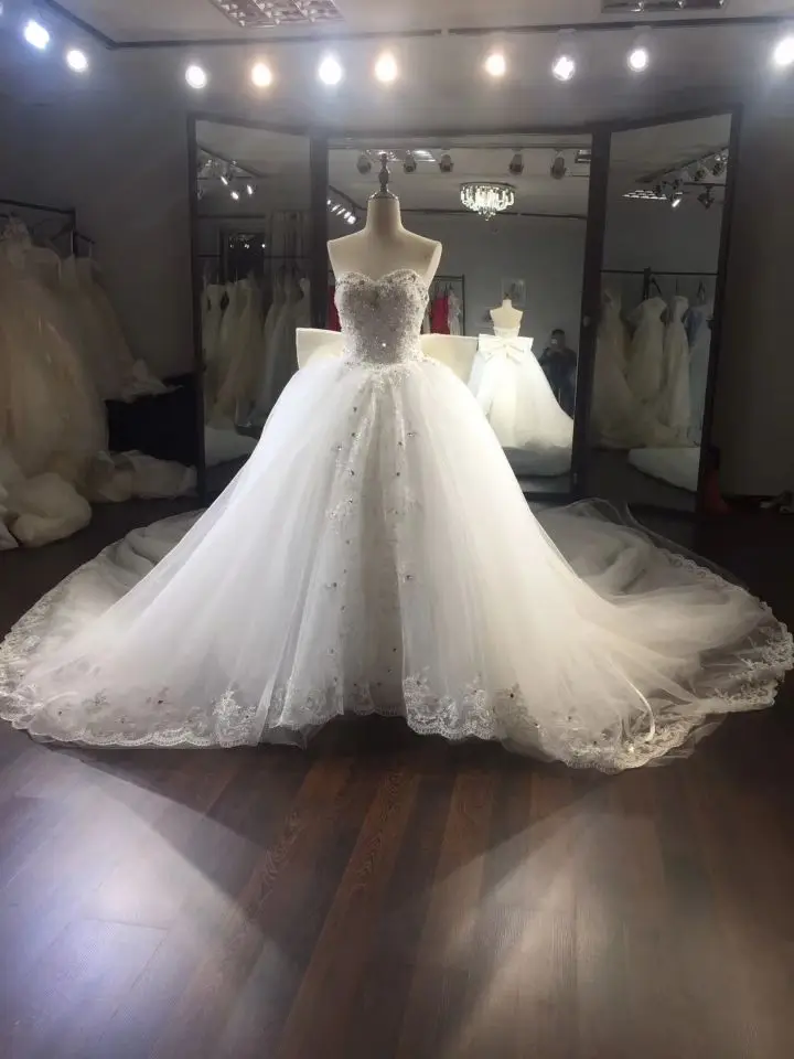 

Elegant A-Line Sweetheart Lace Wedding Dresses with Over Skirt Tulle Lace Up Back Royal Train Bridal Gowns for Women