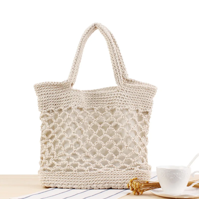 

2019 new solid color cotton hand hook woven bag trend female Sen mobile holiday beach straw bag personalized gift